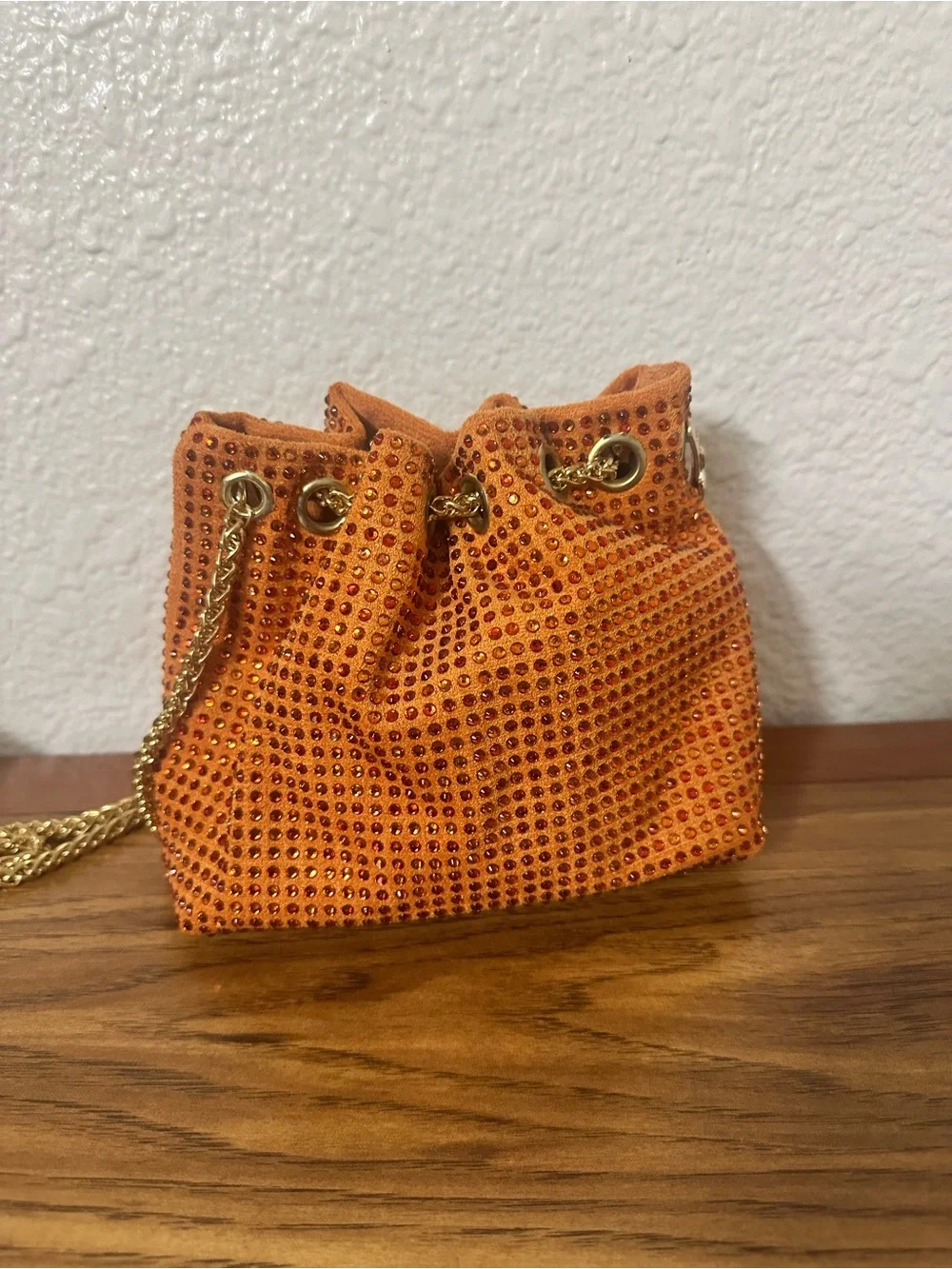 Orange Crystal-Embellished Bucket Bag with Gold Chain Handle
